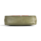 The Happy Shoe Shop Vendula London flower shop coin purse in olive green vegan leather, viewed from the side.