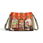 The Happy Shoe Shop Vendula Flower Shop Alice Bag in amber vegan leather with intricate floral appliqué and embroidery.