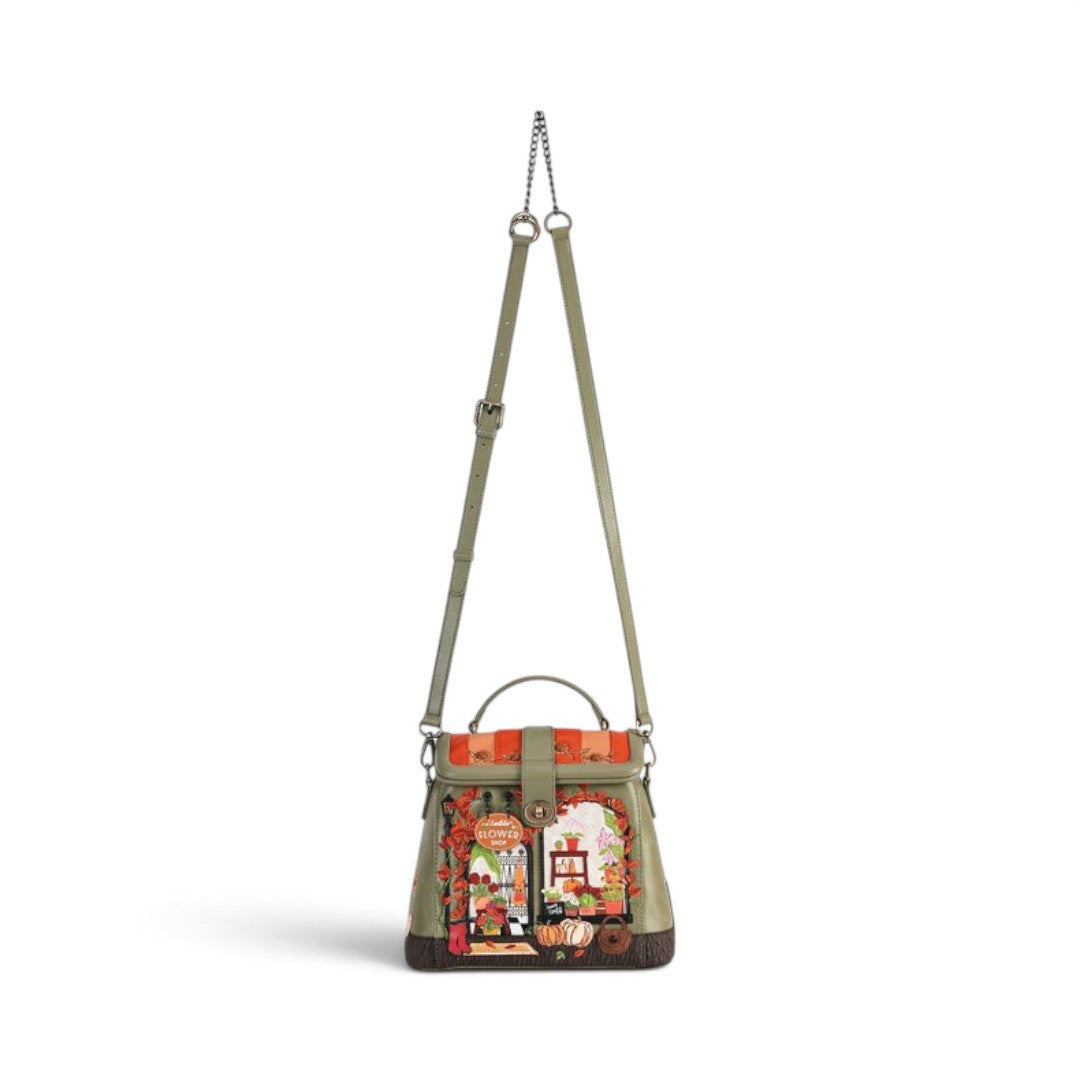 The Happy Shoe Shop Vendula London Lyla backpack in amber with flower shop print, vegan leather, and autumn motifs.