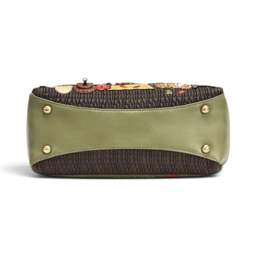 The Happy Shoe Shop Vendula Flower Shop Alice Bag base view showing green vegan leather trim and four gold base studs.