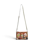 The Happy Shoe Shop Vendula London amber vegan leather flower shop crossbody bag with intricate floral shopfront design.
