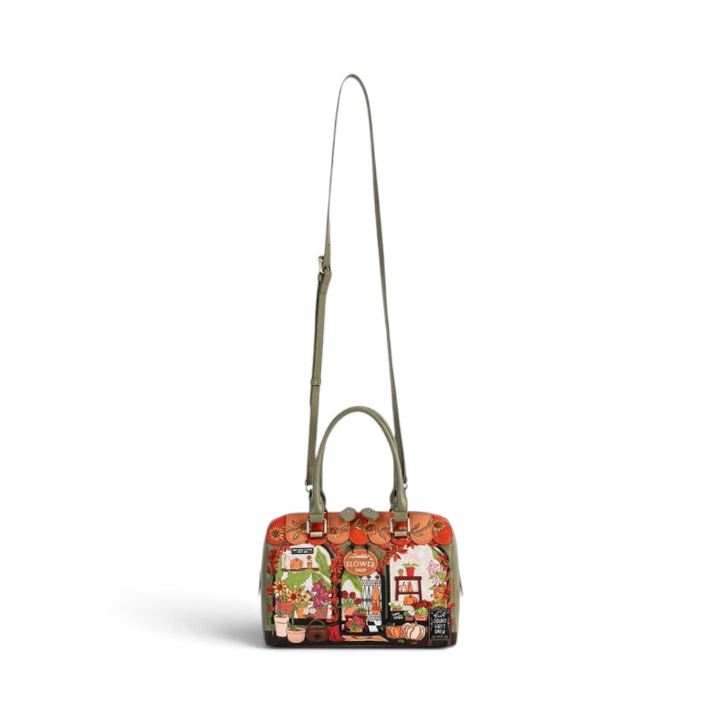 The Happy Shoe Shop Vendula London flower shop bowler bag in amber vegan leather with autumn floral print and strap.