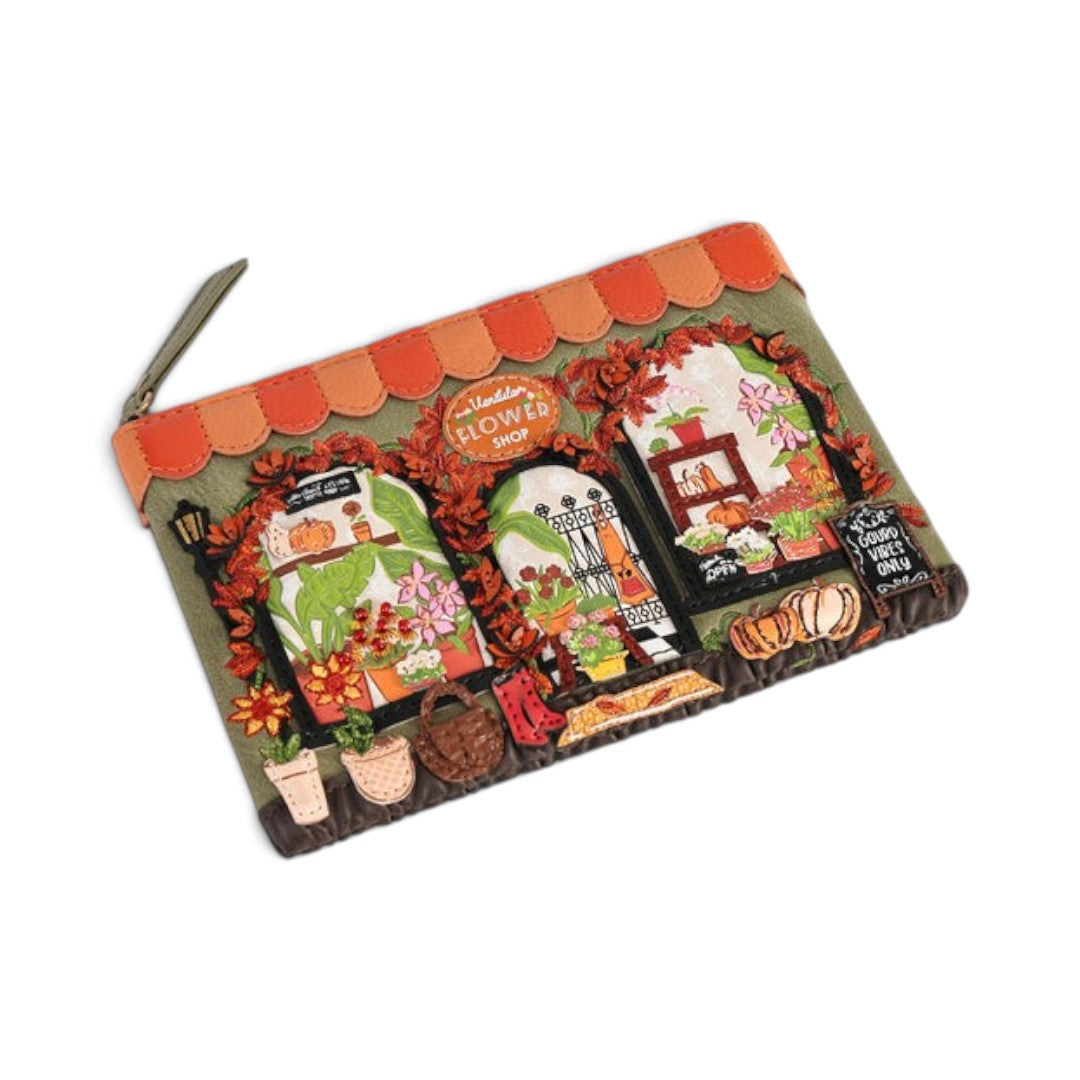 The Happy Shoe Shop Vendula London flower shop zipper coin purse in amber vegan leather with floral and autumn motifs.