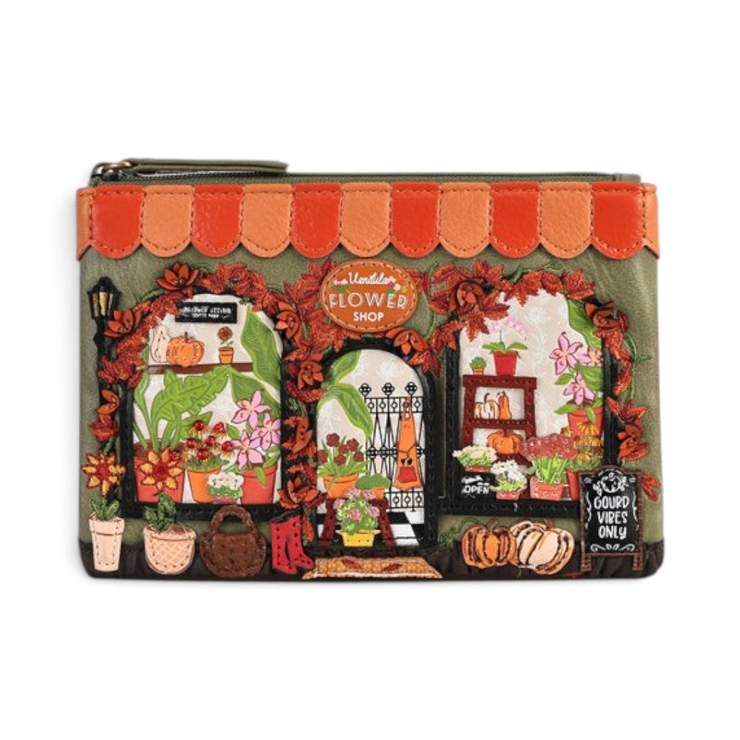 The Happy Shoe Shop Vendula London Flower Shop zipper coin purse in amber vegan leather with floral and gourd motifs.