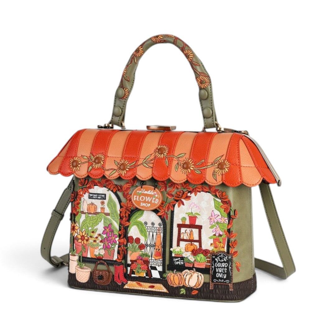The Happy Shoe Shop Vendula London Flower Shop grab bag in amber vegan leather with autumn floral and shop details.