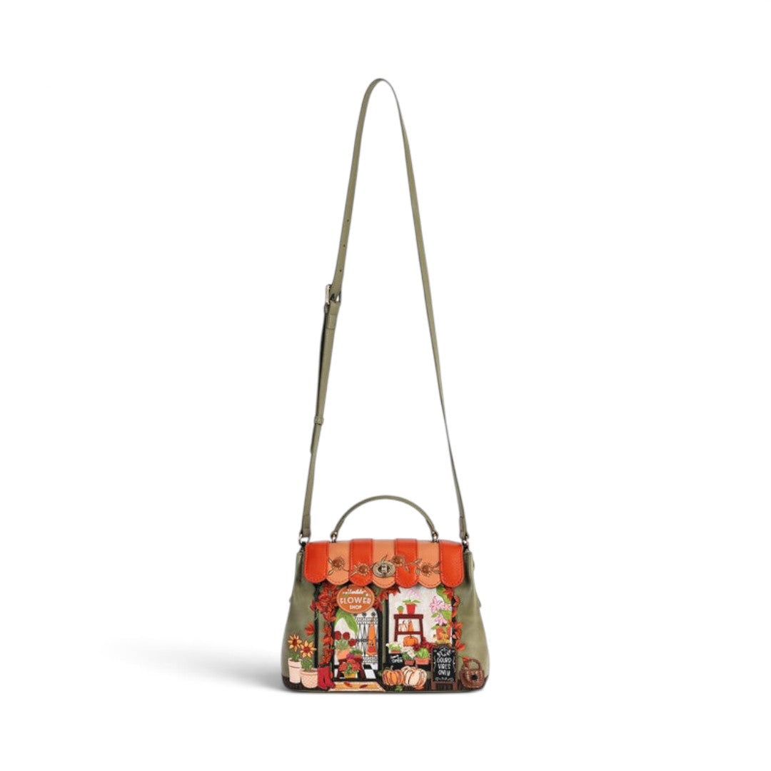The Happy Shoe Shop Vendula London Flower Shop Mini Grace Bag in amber vegan leather with floral and shop front detail.