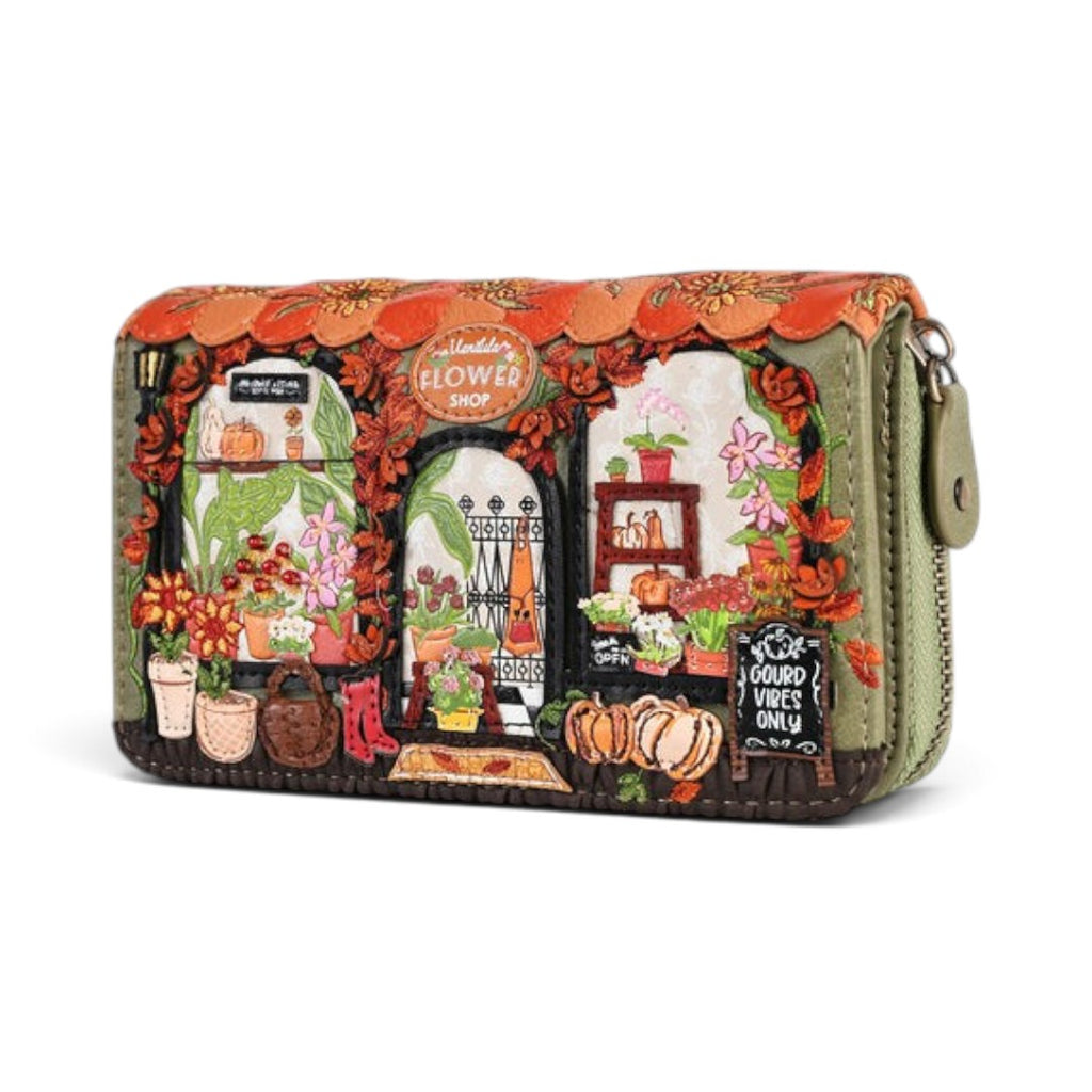 The Happy Shoe Shop Vendula London flower shop wallet in amber vegan leather with autumn floral and pumpkin details.