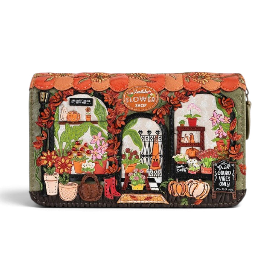 The Happy Shoe Shop Vendula London flower shop wallet in autumn colours with embossed vegan leather and floral details.
