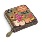 The Happy Shoe Shop Vendula London amber square wallet with floral embroidery and vegan leather flower shop design.