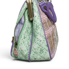 The Happy Shoe Shop Vendula London Grand Hotel Willow Clip Frame Bag in pastel pink and mint green with floral print and hotel facade design.