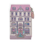 The Happy Shoe Shop Grand Vendula Hotel coin purse in pastel pink and cream vegan leather with hotel facade design.