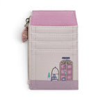 The Happy Shoe Shop Grand Vendula Hotel coin purse in pastel pink and cream vegan leather with hotel scene.