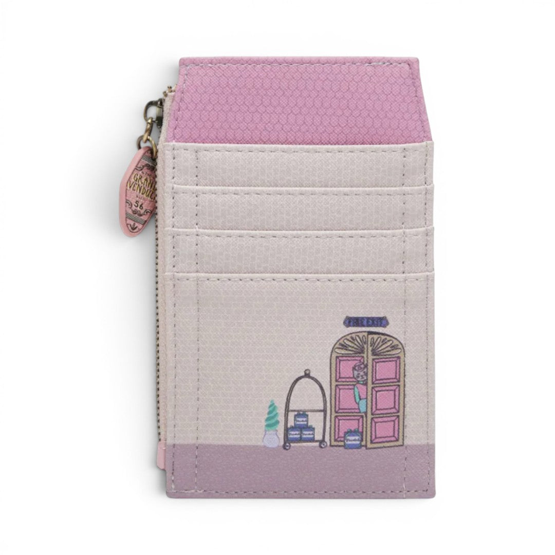 The Happy Shoe Shop Grand Vendula Hotel coin purse in pastel pink and cream vegan leather with hotel scene.