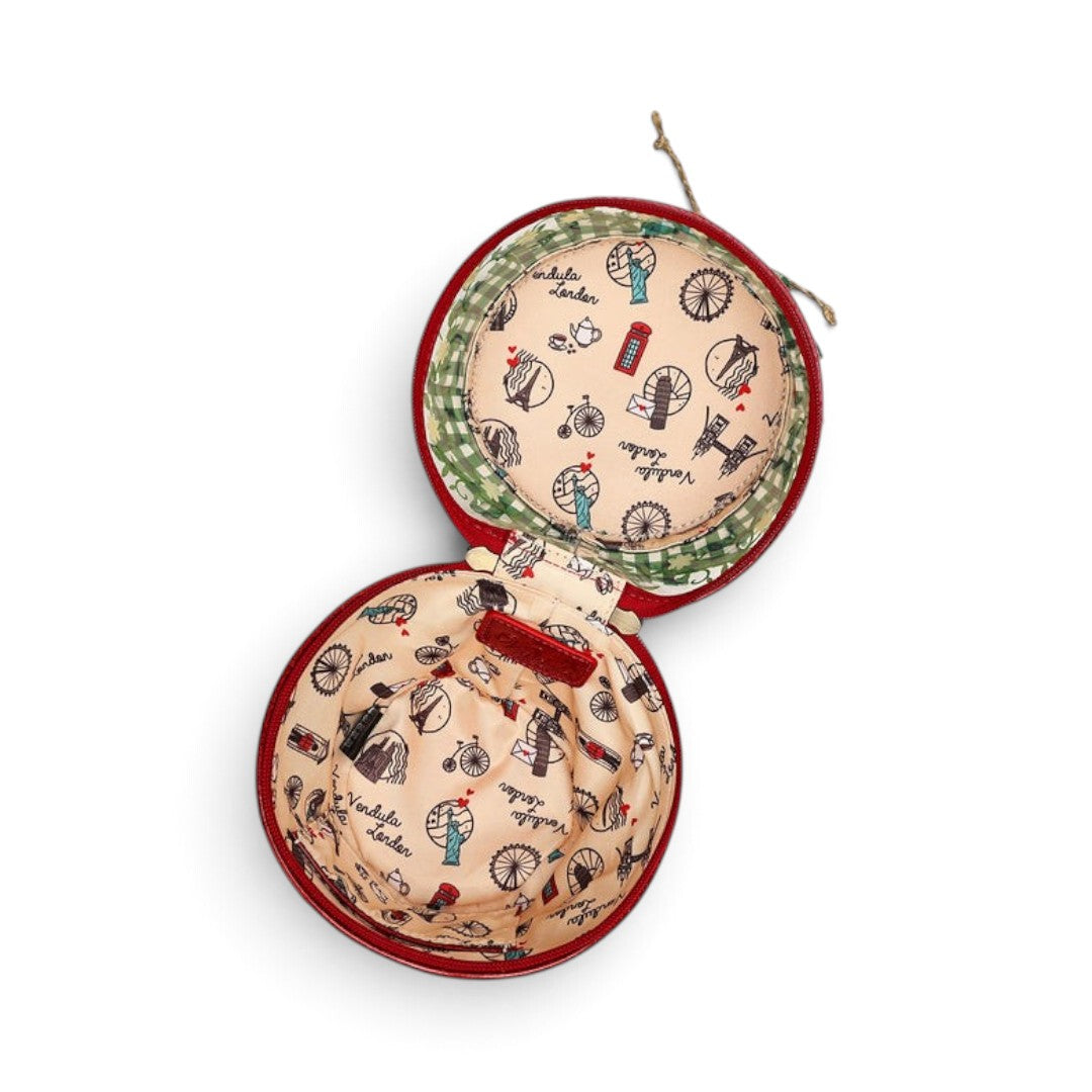 The Happy Shoe Shop Vendula London strawberry jam bag open to show the iconic shopfront patterned cotton lining