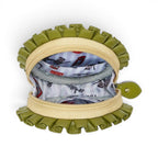 The Happy Shoe Shop Vendula London Shakespeare's Twelfth Night round coin purse in vegan leather with green ruffled trim and London-themed lining.