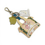 The Happy Shoe Shop Vendula London Shakespeare's Theatre Twelfth Night key charm, vegan leather, yellow with cat illustration.