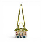 The Happy Shoe Shop Vendula London Shakespeare's Theatre Twelfth Night Grab Bag, a structured vegan leather handbag with a theatre facade print and green trim.