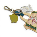 The Happy Shoe Shop Vendula London Shakespeare's Twelfth Night cat charm, made of vegan leather with intricate stitching and antique brass hardware.