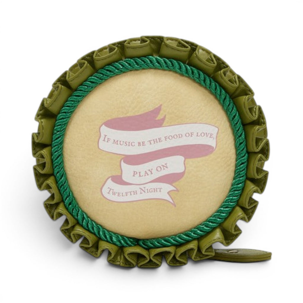 The Happy Shoe Shop Vendula London Shakespeare's Twelfth Night round coin purse in light tan vegan leather with green trim and pink ribbon detail.