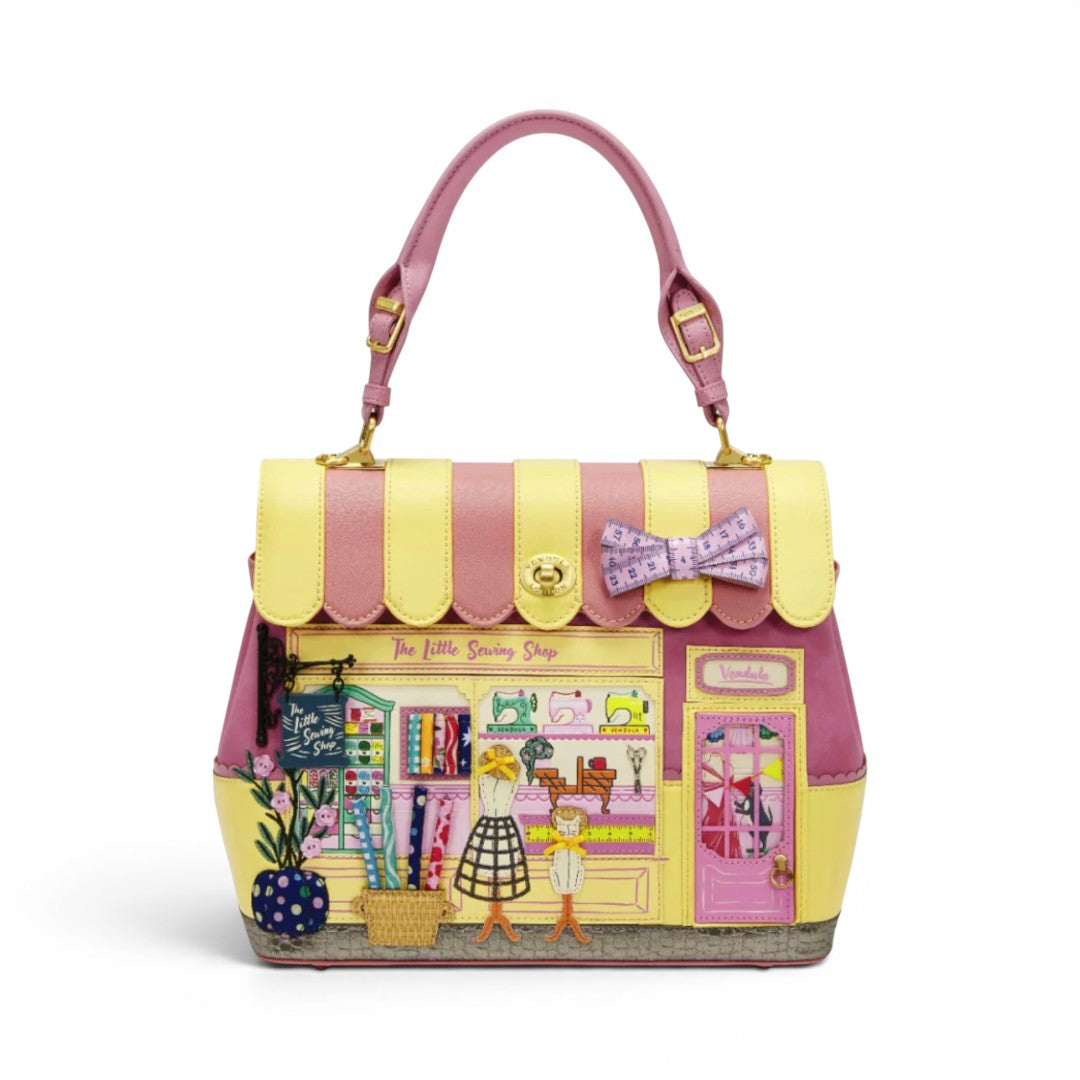 The Happy Shoe Shop Vendula London Sewing Shop Grace Bag in raspberry and yellow vegan leather with vintage details.