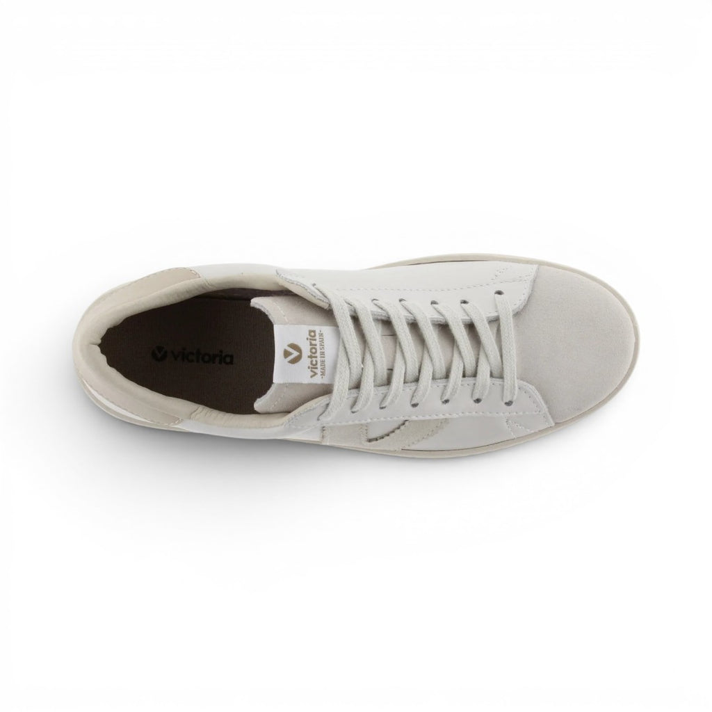The Happy Shoe Shop Victoria Berlin white leather sneakers with suede toe detail and lace-up closure, top view.