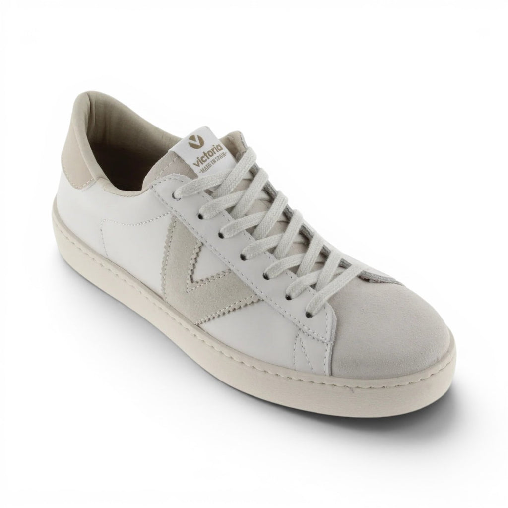 The Happy Shoe Shop Victoria Berlin white leather sneakers with suede toe and side V-detail, made in Spain.