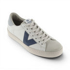 The Happy Shoe Shop Victoria Berlin white leather sneakers with blue V-side detail and suede toe cap.