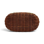 The Happy Shoe Shop Vendula London flower shop basket bag showing the brown woven wicker base from a bottom view.