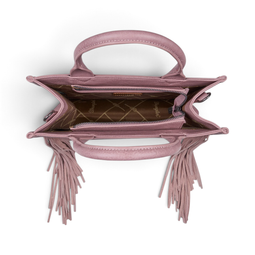 Top view of The Happy Shoe Shop Wrangler Adelyn bag in dusty pink with suede fringe and branded interior lining