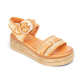 The Happy Shoe Shop Sala Dara sandals in tan leather and raffia with a platform sole and ornamental buckle detail.