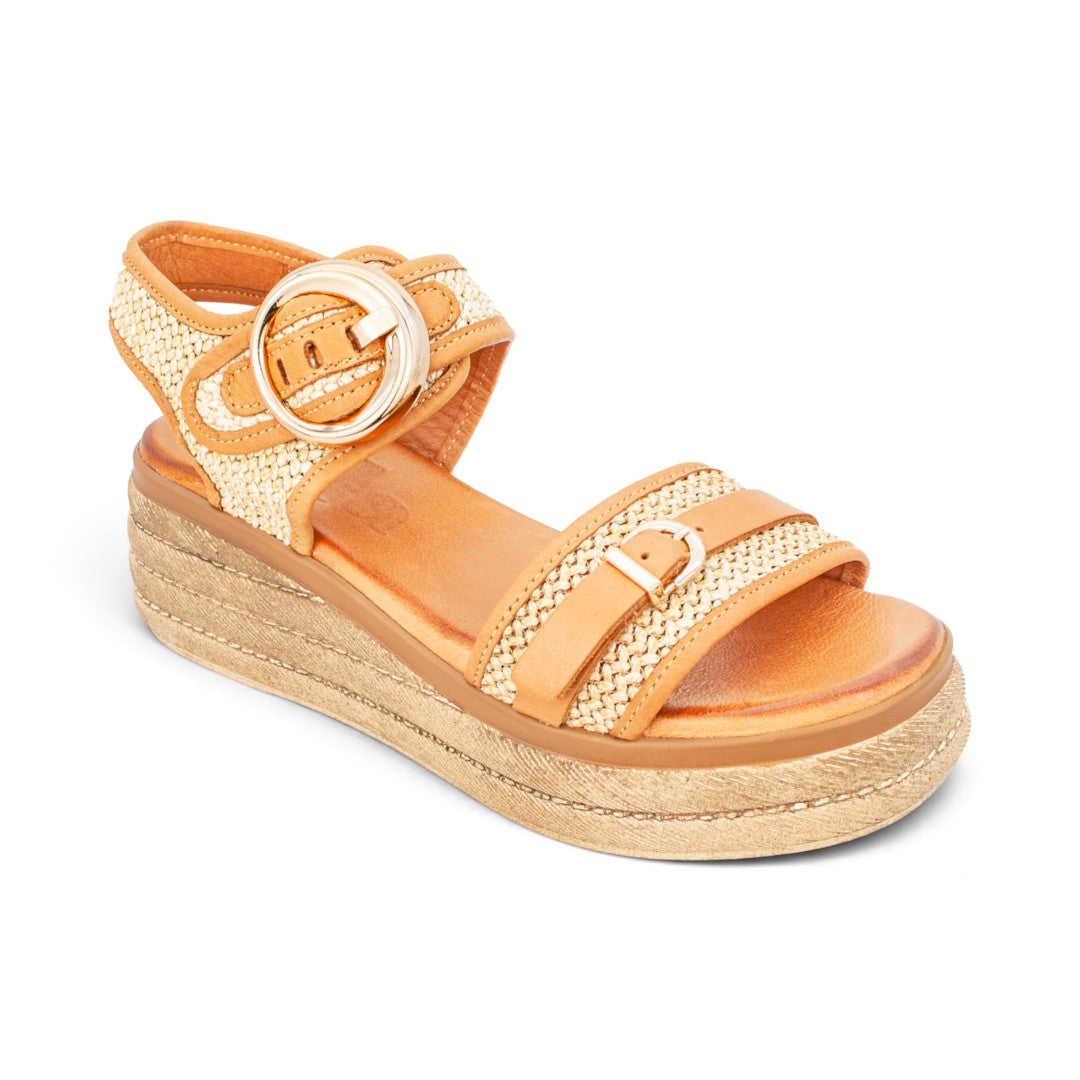 The Happy Shoe Shop Sala Dara sandals in tan leather and raffia with a platform sole and ornamental buckle detail.